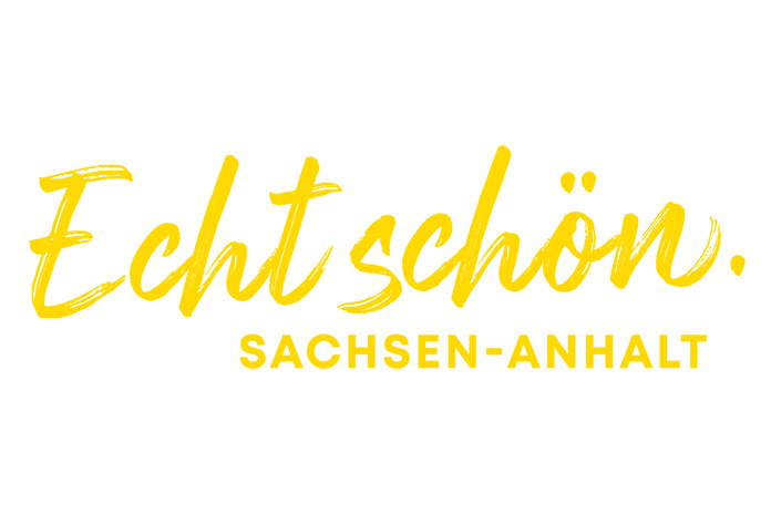 Schriftzug "Echt schön. Sachsen Anhalt. in gelb auf weißem Untergrund.
